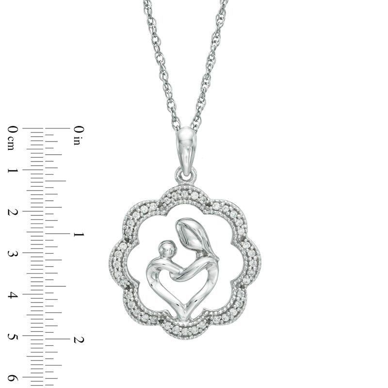 0.15 CT. T.W. Diamond Motherly Love Flower Pendant in Sterling Silver