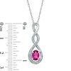 Thumbnail Image 1 of Oval Lab-Created Ruby and Diamond Accent Infinity Twist Pendant in Sterling Silver