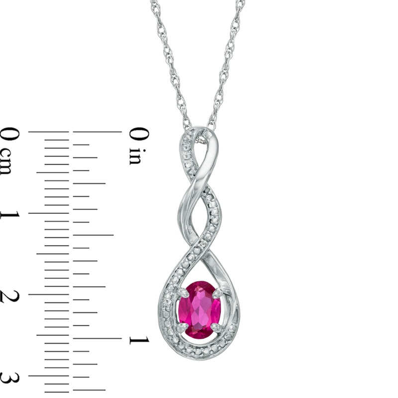Oval Lab-Created Ruby and Diamond Accent Infinity Twist Pendant in Sterling Silver