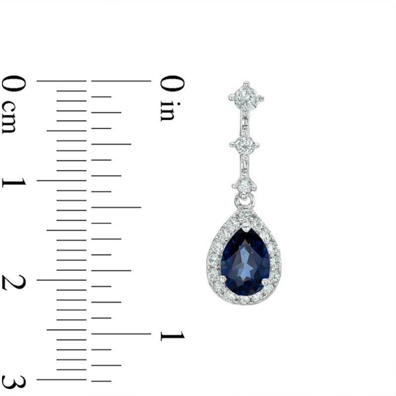 Mesmerizing glamour These frameless labgrown sapphire earrings are  accented with frameless simulated diamonds in sterling silver bonded with  platinum combined with 14karat gold components  Diamond  Design