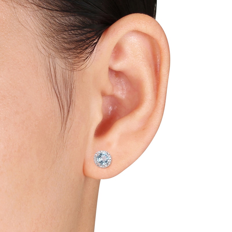 5.0mm Sky Blue Topaz and 0.07 CT. T.W. Diamond Frame Stud Earrings in Sterling Silver