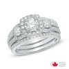 Thumbnail Image 0 of 1.56 CT. T.W. Certified Canadian Diamond Three Stone Frame Engagement Ring in 14K White Gold (I/I2)