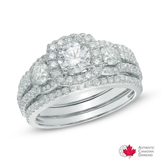 1.56 CT. T.W. Certified Canadian Diamond Three Stone Frame Engagement Ring in 14K White Gold (I/I2)