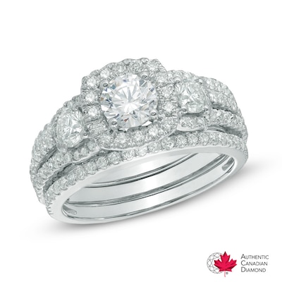 1.56 CT. T.W. Certified Canadian Diamond Three Stone Frame Engagement Ring in 14K White Gold (I/I2)