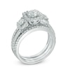 1.56 CT. T.W. Certified Canadian Diamond Three Stone Frame Engagement Ring in 14K White Gold (I/I2)