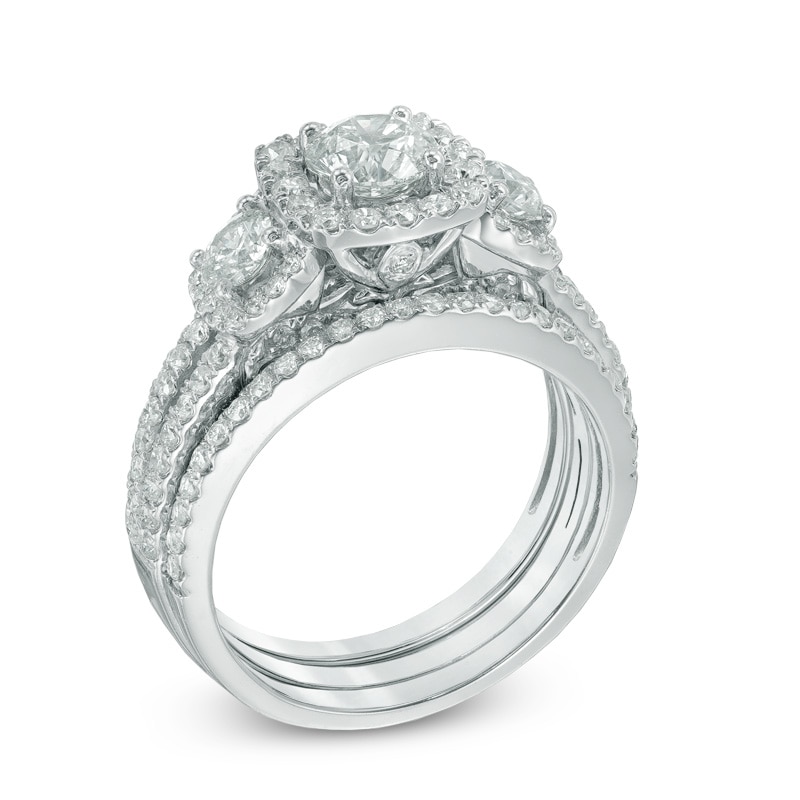 1.56 CT. T.W. Certified Canadian Diamond Three Stone Frame Engagement Ring in 14K White Gold (I/I2)