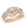 Thumbnail Image 1 of 0.63 CT. T.W. Diamond Tri-Sides Bridal Set in 10K Gold