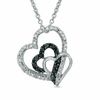 0.15 CT. T.W. Enhanced Black and White Diamond Three Hearts Pendant in Sterling Silver