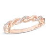 Thumbnail Image 0 of 0.12 CT. T.W. Diamond Twisting Anniversary Band in 10K Rose Gold