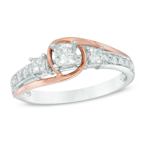 0.63 CT. T.W. Certified Canadian PrincessCut Diamond Three Stone