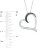 Thumbnail Image 1 of 0.13 CT. T.W. Enhanced Black and White Diamond Tilted Heart Pendant in Sterling Silver
