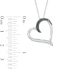 0.13 CT. T.W. Enhanced Black and White Diamond Tilted Heart Pendant in Sterling Silver