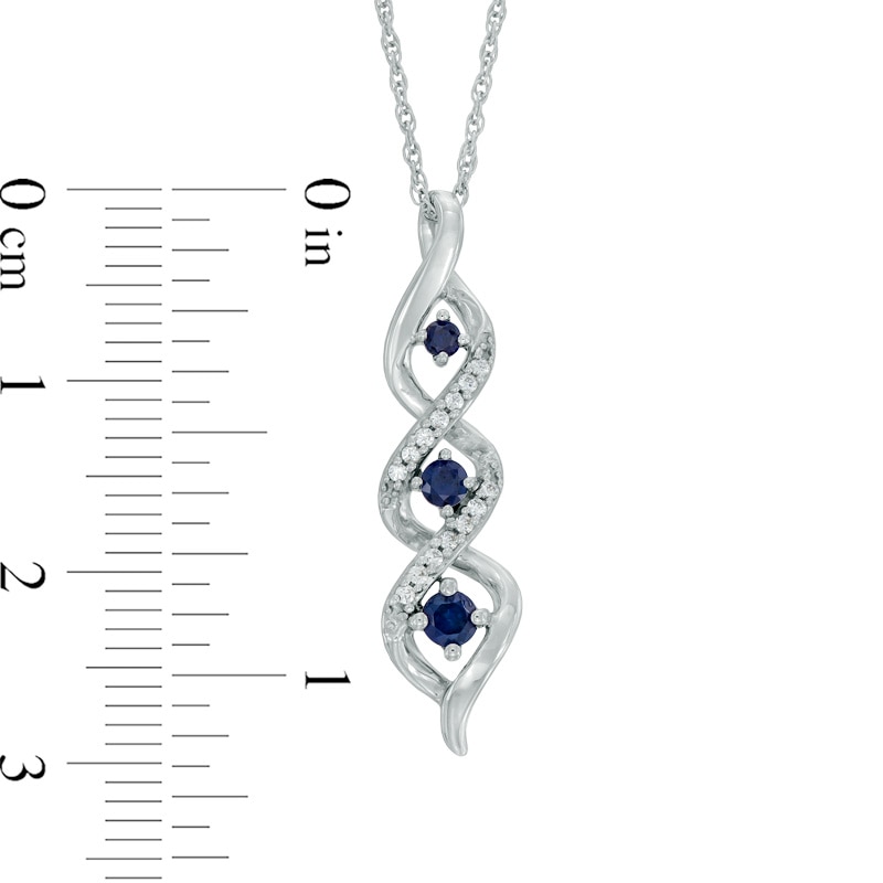 Lab-Created Blue Sapphire and Diamond Accent Three Stone Pendant in Sterling Silver