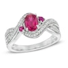 Oval Lab-Created Ruby and 0.16 CT. T.W. Diamond Swirl Ring in Sterling Silver