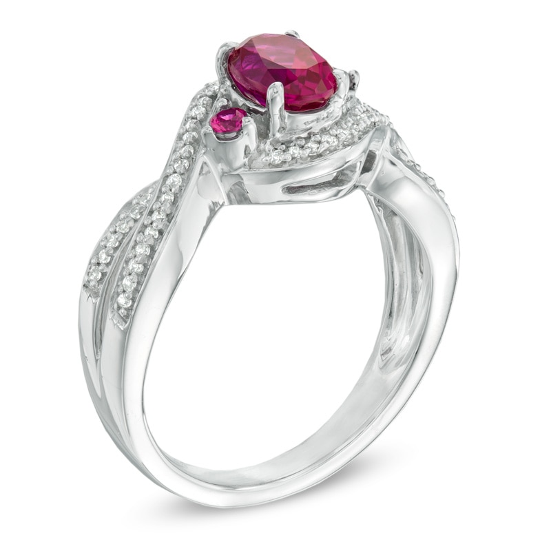 Oval Lab-Created Ruby and 0.16 CT. T.W. Diamond Swirl Ring in Sterling Silver
