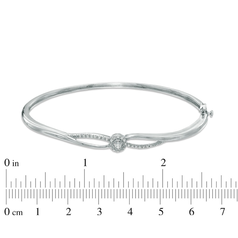 0.14 CT. T.W. Certified Canadian Diamond Centre Braid Bangle in Sterling Silver (I/I2)