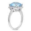 10.0mm Cushion-Cut Blue Topaz and 0.10 CT. T.W. Diamond Frame Ring in 10K White Gold