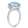 Thumbnail Image 1 of 10.0mm Cushion-Cut Blue Topaz and 0.10 CT. T.W. Diamond Frame Ring in 10K White Gold