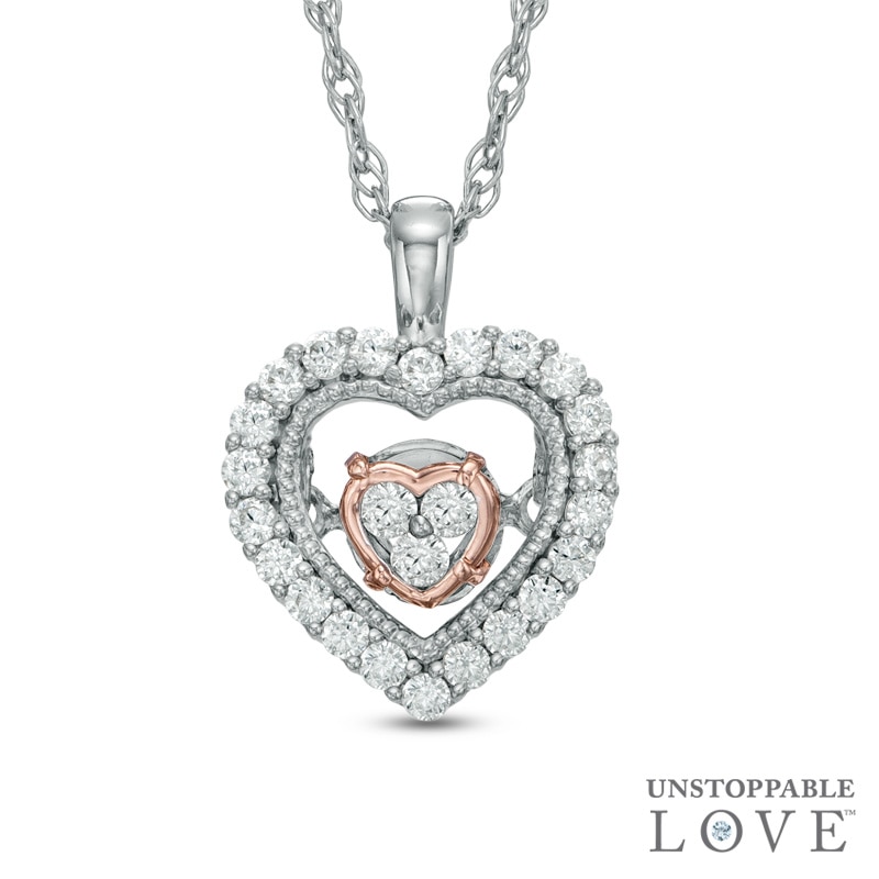 Unstoppable Love™ 0.15 CT. T.W. Diamond Heart in Heart Pendant in 10K Two-Tone Gold