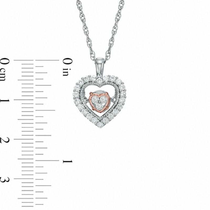 Unstoppable Loveâ¢ 0.15 CT. T.W. Diamond Heart in Heart Pendant in 10K Two-Tone Gold