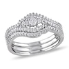 0.47 CT. T.W. Diamond Swirl Three Piece Bridal Set in 10K White Gold