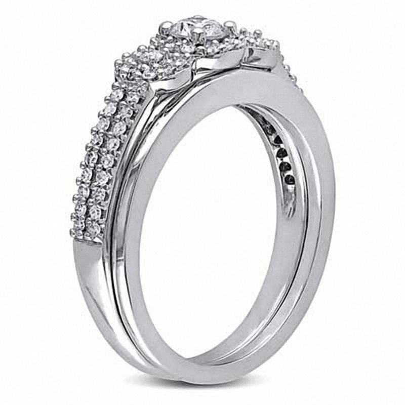 0.49 CT. T.W. Diamond Three Stone Frame Bridal Set 10K White Gold