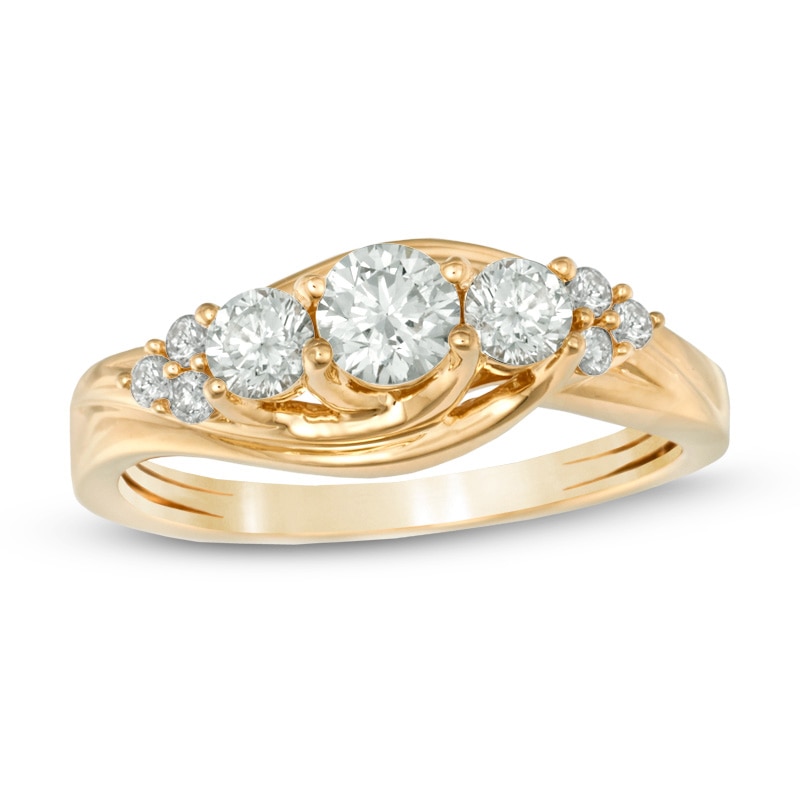 0.70 CT. T.W. Certified Canadian Diamond Three Stone Engagement Ring in 14K Gold (I/I2)
