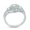 0.95 CT. T.W. Certified Canadian Diamond Frame Three Stone Engagement Ring in 14K White Gold (I/I2)