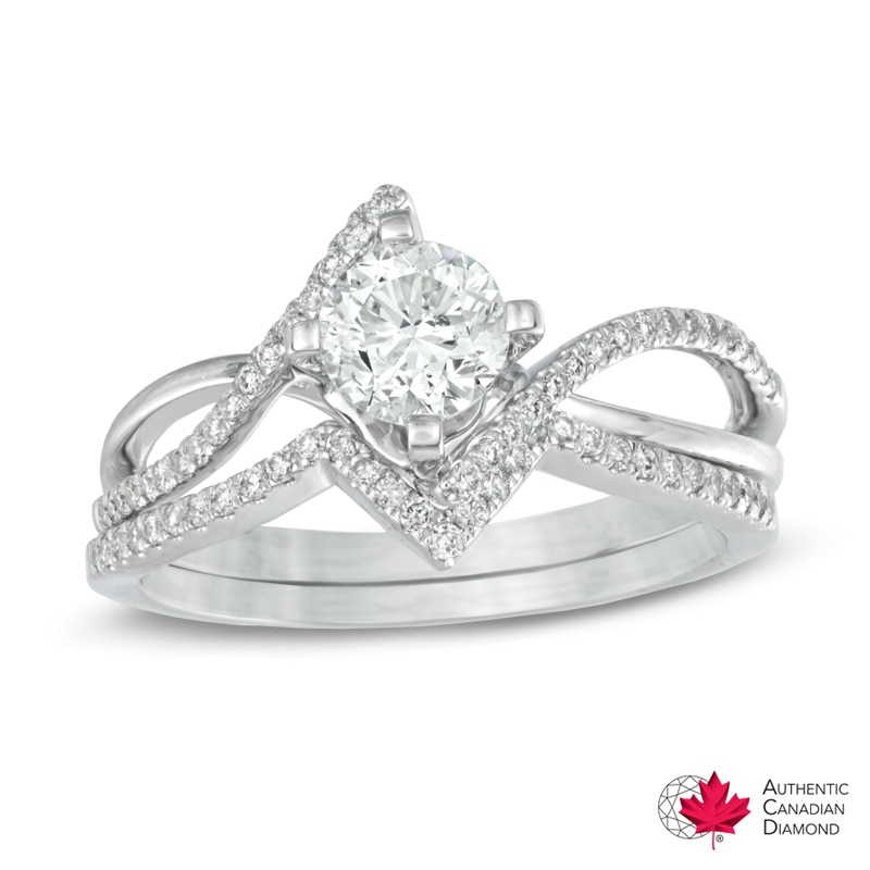 0.95 CT. T.W. Certified Canadian Diamond Split Shank Bridal Set in 14K White Gold (I/I2)