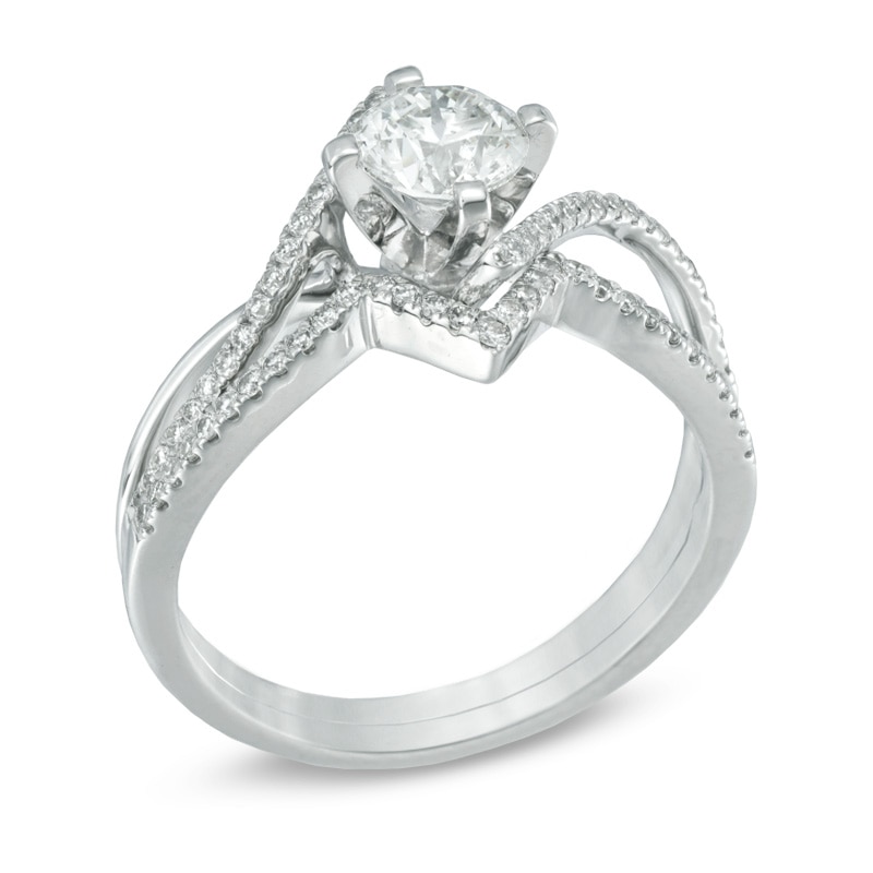 0.95 CT. T.W. Certified Canadian Diamond Split Shank Bridal Set in 14K White Gold (I/I2)