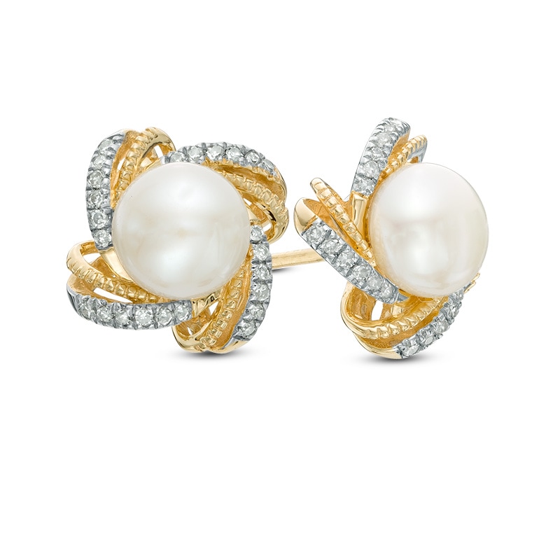 6.0mm Cultured Freshwater Pearl and 0.11 CT. T.W. Diamond Stud Earrings in 10K Gold|Peoples Jewellers