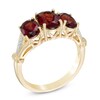 Thumbnail Image 1 of Oval Garnet and Diamond Accent Three Stone Ring in 10K Gold