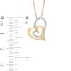0.11 CT. T.W. Diamond Tilted Double Heart Pendant in 10K Gold