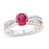 6.0mm Lab-Created Ruby and 0.38 CT. T.W. Round and Baguette Diamond Ring in 10K Two-Tone Gold