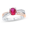 Thumbnail Image 0 of 6.0mm Lab-Created Ruby and 0.38 CT. T.W. Round and Baguette Diamond Ring in 10K Two-Tone Gold