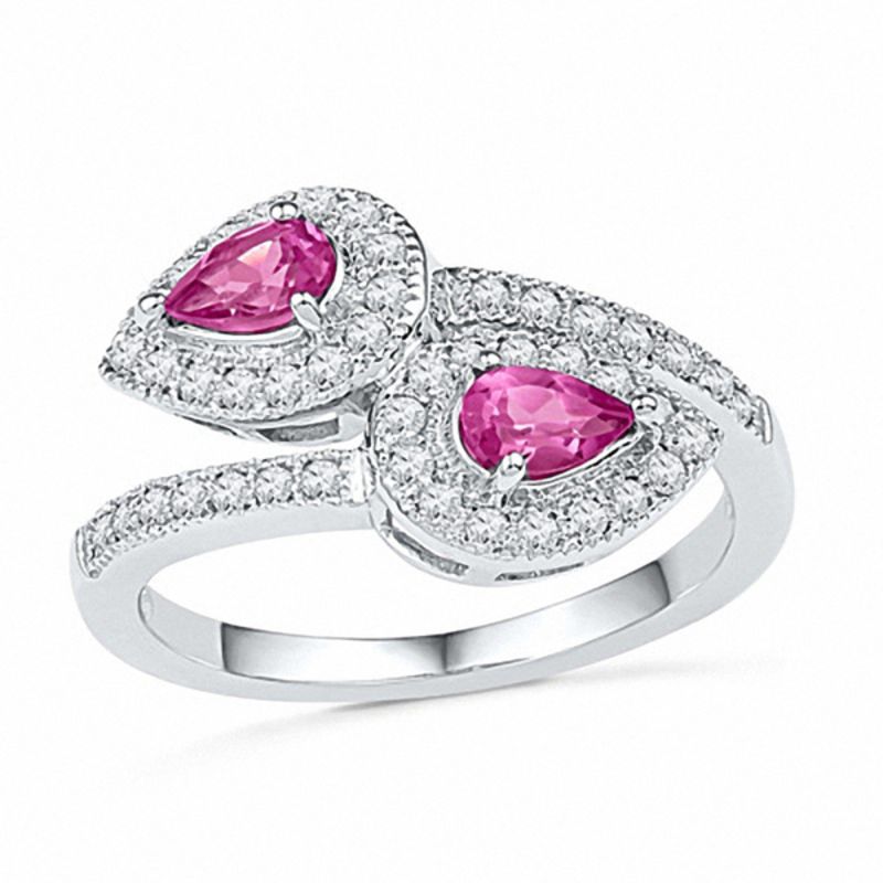 Pear-Shaped Lab-Created Pink Sapphire and 0.30 CT. T.W. Diamond Frame Bypass Ring in Sterling Silver