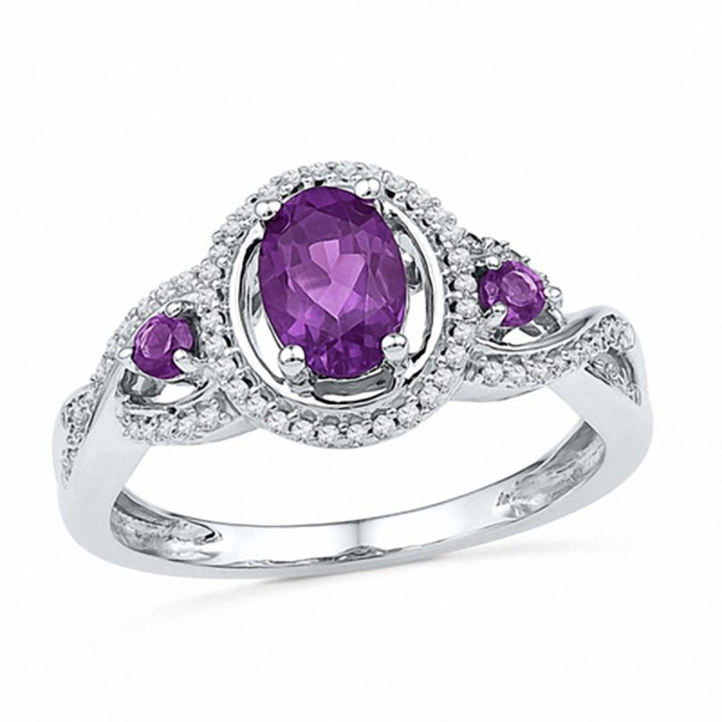 Oval Amethyst and 0.18 CT. T.W. Diamond Three Stone Ring in Sterling Silver