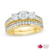 Thumbnail Image 1 of 1.49 CT. T.W. Certified Canadian Diamond Three Stone Bridal Set in 14K Gold (I/I1)