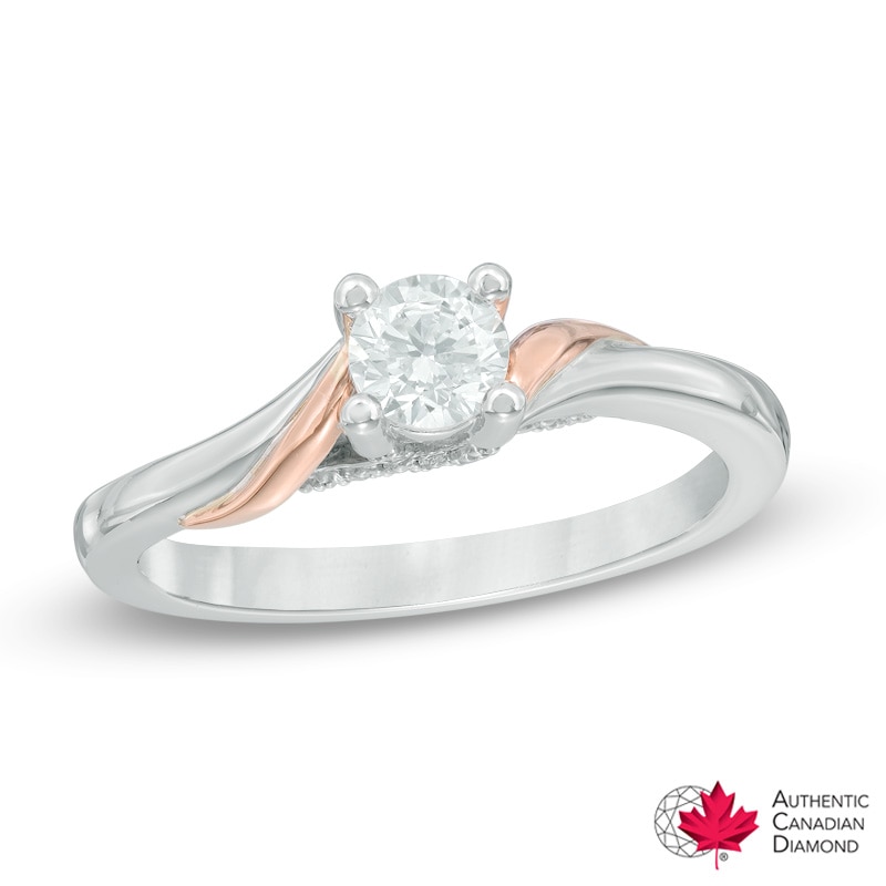 0.35 CT. T.W. Certified Canadian Diamond Twist Engagement Ring in 14K Two-Tone Gold (I/I1)