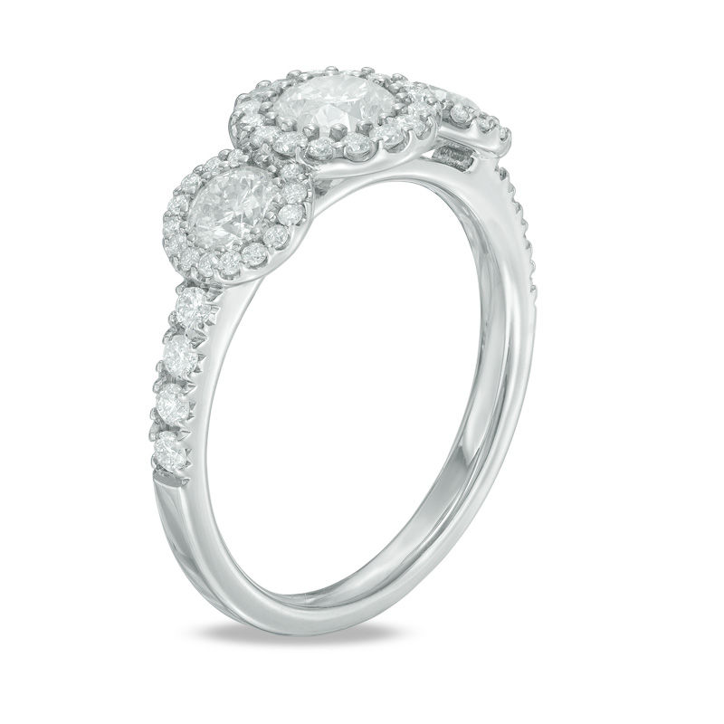 1.40 CT. T.W. Certified Canadian Diamond Frame Three Stone Engagement Ring in 14K White Gold (I/I2)