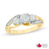 1.00 CT. T.W. Certified Canadian Diamond Three Stone Split Shank Engagement Ring in 14K Gold (I/I2)