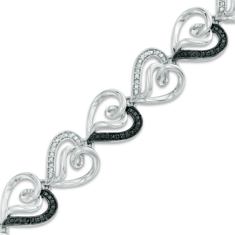 0.09 CT. T.W. Enhanced Black and White Diamond Curlique Heart Link Bracelet in Sterling Silver - 7.5"
