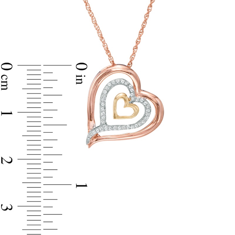 Main Image 2 of 0.11 CT. T.W. Diamond Triple Row Tilted Heart Pendant in 10K Tri-Tone Gold