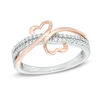 Thumbnail Image 0 of 0.15 CT. T.W. Diamond Mirrored Hearts Promise Ring in 10K Two-Tone Gold