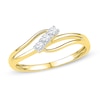 0.11 CT. T.W. Diamond Three Stone Bypass Ring in 10K Gold