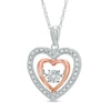 Thumbnail Image 0 of Unstoppable Love™ 0.09 CT. T.W. Diamond Heart Pendant in 10K Two-Tone Gold