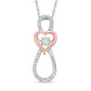 Thumbnail Image 0 of Unstoppable Love™ 0.15 CT. T.W. Diamond Infinity with Heart Pendant in 10K Two-Tone Gold
