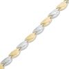 Thumbnail Image 0 of Twist Stampato Bracelet in 10K Two-Tone Gold - 7.25"