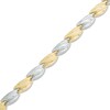 Thumbnail Image 1 of Twist Stampato Bracelet in 10K Two-Tone Gold - 7.25"
