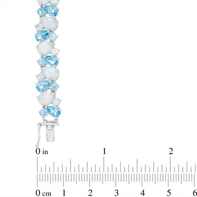 Pear-Shaped Blue Topaz, Lab-Created Opal and White Sapphire Bracelet in Sterling Silver - 7.25"